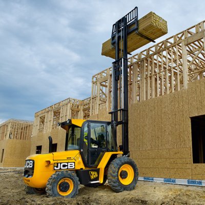 Forklift unloading machinery and industrial equipment in Woolwich